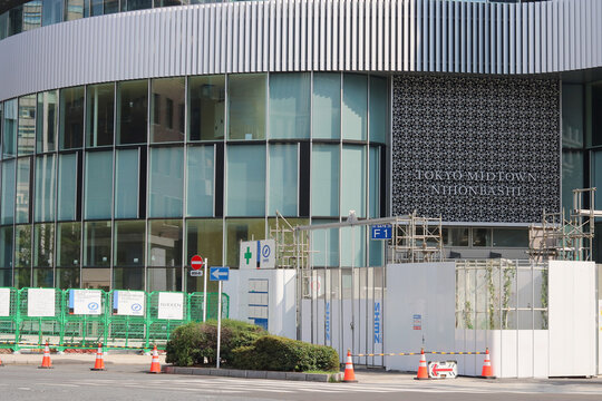 TOKYO, JAPAN - August 2, 2026: Fence in front of the under-construction Tokyo Midtown Nihonbashi.