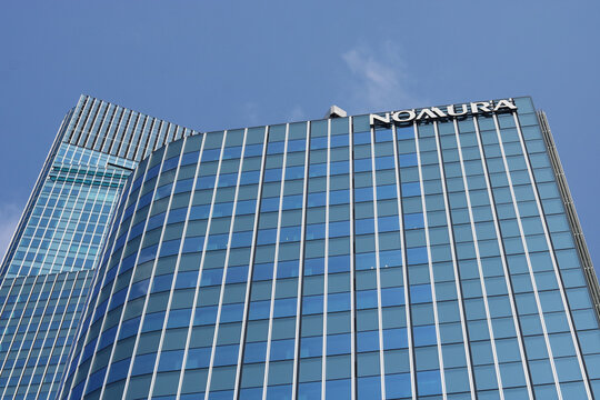 TOKYO, JAPAN - August 2, 2026: Nomura sign on top of Nomura Mitsui Tower, which is part of Tokyo Midtown Nihonbashi.