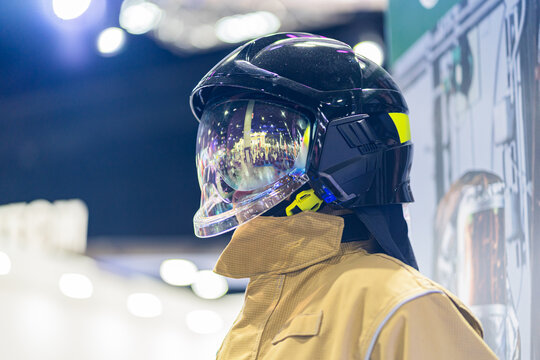 Fire Suit Fire-resistant safety helmets, fire-resistant suits, firefighting suits.Rescue fire service protective clothing details Maniken in the helmet and the form of a rescuer. Industry