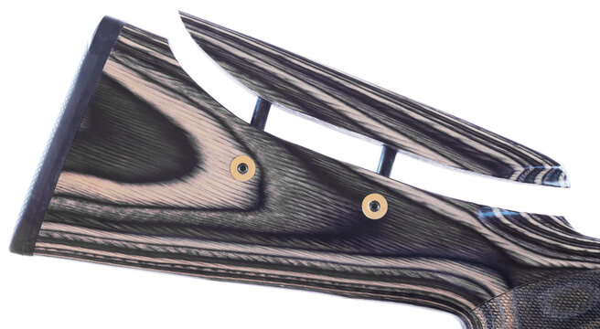 Cheek piece on a wood stocked shotgun moved up for comfort