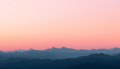 Fototapeta premium Mountain landscape at sunset. Scenic view of hazy hills during golden hour.
