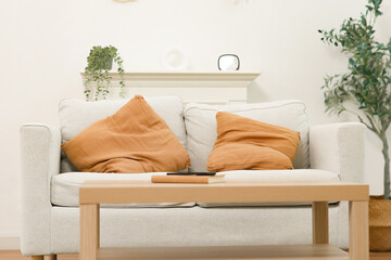 Living room sofa furniture and home decor : Living room living space in a modern yet vintage style home.  © ฺฺฺBoonterm