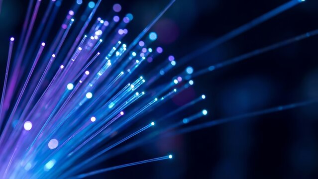 Fiber optic strands glowing with a deep blue and purple hue, representing connectivity and data transmission