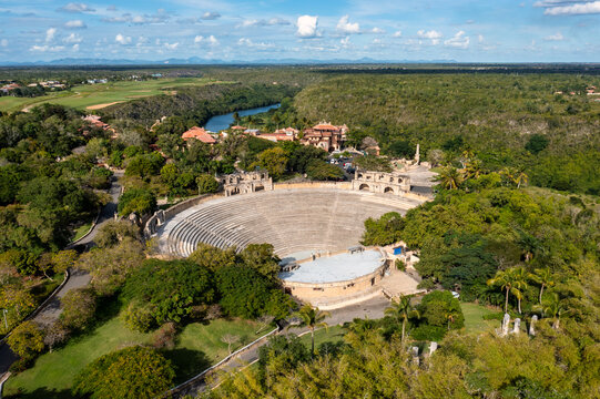 Aerial view of the Altos de Chavon Amphitheater surrounded by lush greenery and the Chavon River in La Romana, La Romana Province, Dominican Republic.