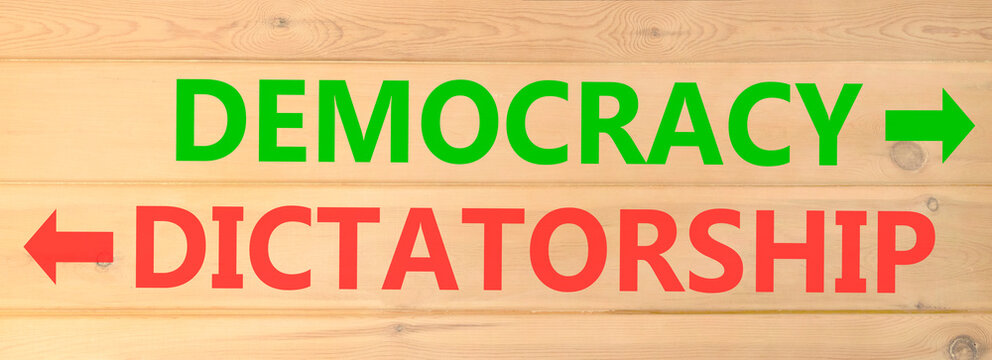 Democracy or dictatorship words symbol. Concept words Democracy Dictatorship on beautiful wooden wall. Beautiful wooden wall background. Business democracy dictatorship concept. Copy space