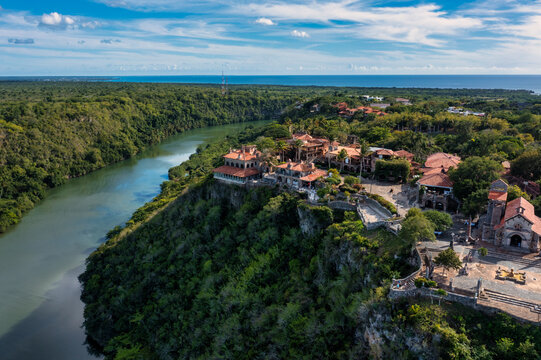 Aerial view of the historic Altos de Chavon village with stone architecture on a cliff above the Chavon River in La Romana, La Romana Province, Dominican Republic.