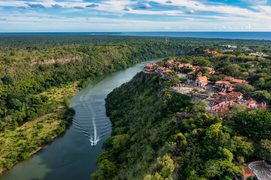 Aerial view of Altos de Chavon overlooking the Chavon River with its stone architecture and lush tropical landscape in La Romana, La Romana Province, Dominican Republic.