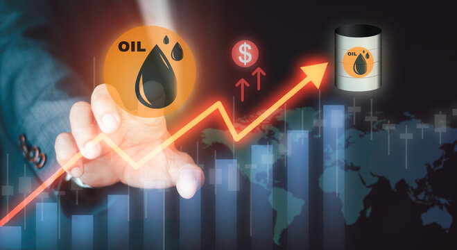 Businessman pointing at crude oil price rise graph arrow with barrel icon concept. Global energy commodity trading, inflation surge, fuel market growth, and financial crisis.