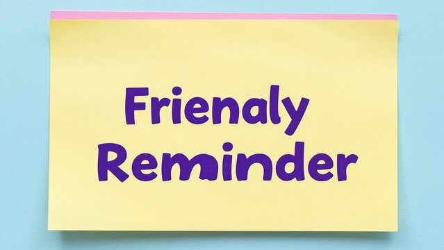 A cheerful yellow sticky note with purple text reading 'Friendly Reminder' against a soft blue background, perfect for gentle reminders or personal notes.