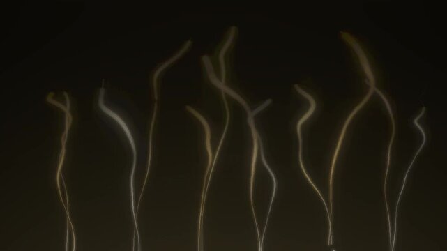Thin smoke trails rising and spiraling wisps abstract dark background seamless loop in vibrant bronze tones