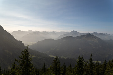 Fototapeta premium Layered alpine ridges stretching toward the horizon