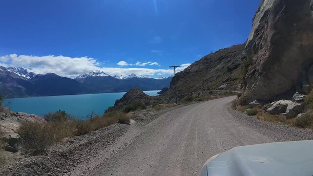 Driving Along Gravel Road Towards Chile Chico With Scenic View Of Lago General Carrera In Chilean Patagonia