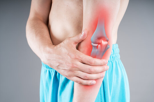 Diseases of the elbow joint, bone fracture and inflammation, man suffering from pain in cubit