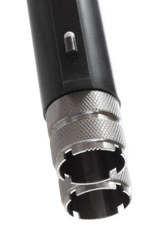 Choke tubes on an over-under shotgun