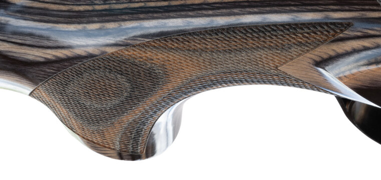 Close-up of the checkering on a wood stocked shotgun