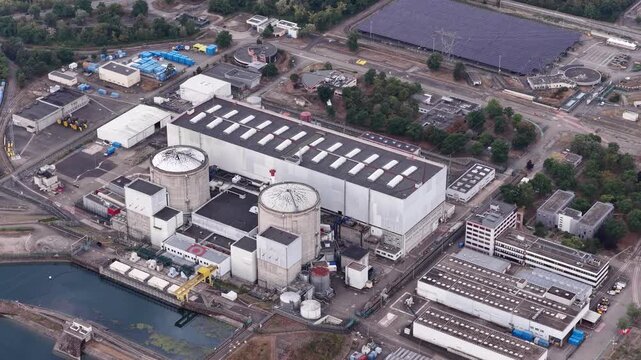 Aerial view of the Fessenheim Nuclear Power Plant with its reactor containment buildings and industrial facilities located in Fessenheim, Grand Est, France.