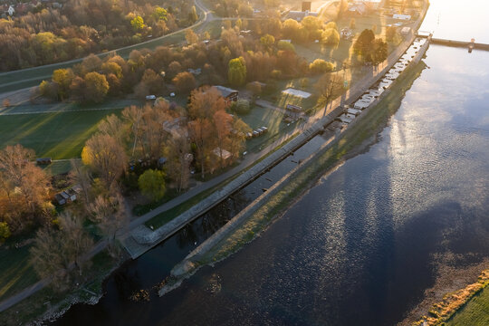 Aerial view of the Vltava river in Prague with the artificial white water canal ready for canoeing and kayaking. Early morning atmosphere by the sports venue as seen from the air.