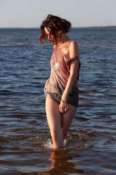 Woman wading in open water
