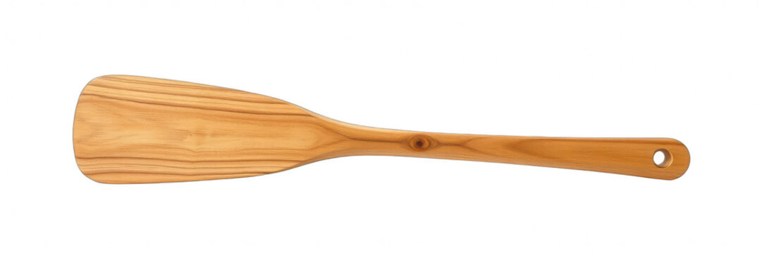 Wooden cooking spatula isolated on black background
