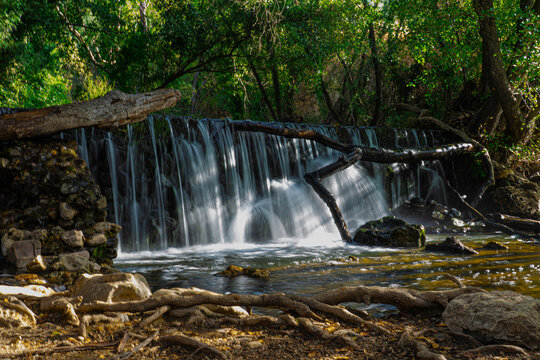 El Hervidero Waterfall, in Guadalix de la Sierra, among trees in a natural setting