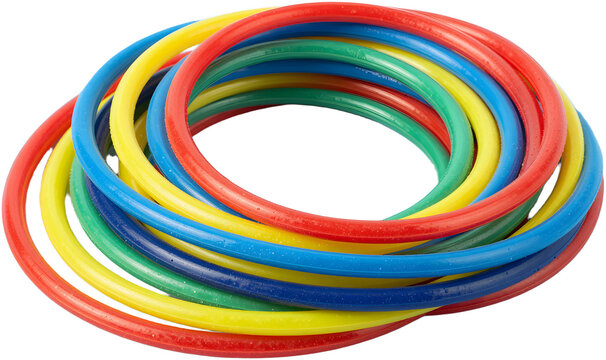 Stack of colorful plastic ring toss rings on blue background