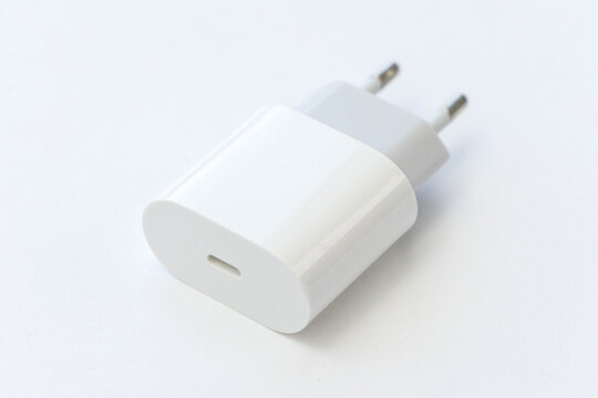 White USB C wall charger adapter on white background