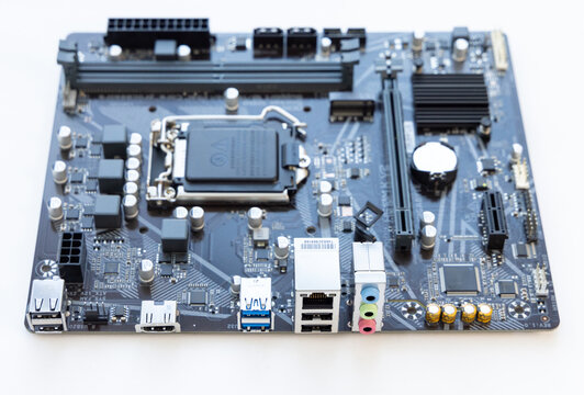 Close up view of a modern computer motherboard isolated on white