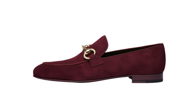 Burgundy suede loafer with gold horsebit detail, isolated on transparent background