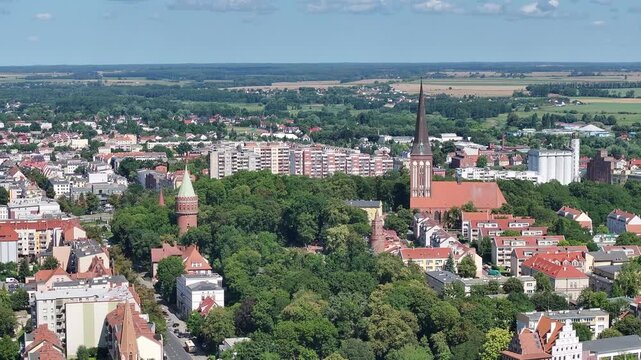 Stargard Poland church city center parks apartments 1. Northern Poland in 8th century. Historical stronghold, defensive walls, gates towers. WW II POW camp controlled by Germany. Brick church.