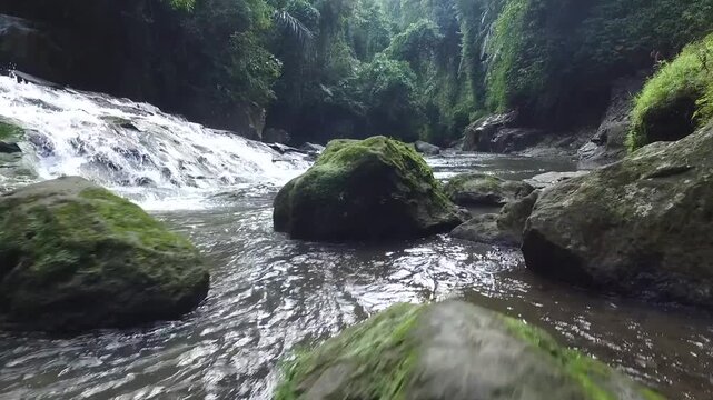Rang Reng Cave river and waterfall in Bali, Indonesia