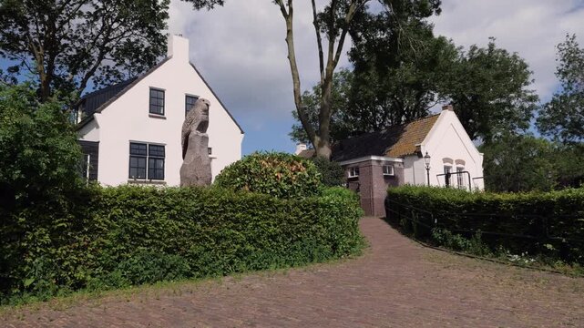 Pan Shot of Historic Water Sluice House in Polder Eemnes