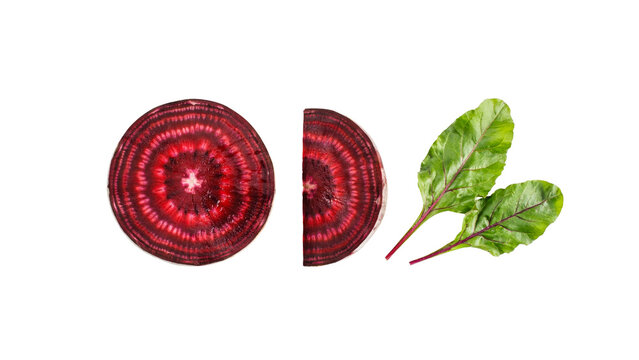 Fresh organic sliced beetroot showing vibrant red rings and green leaves arranged neatly for healthy food photography projects isolated perfectly on transparent background