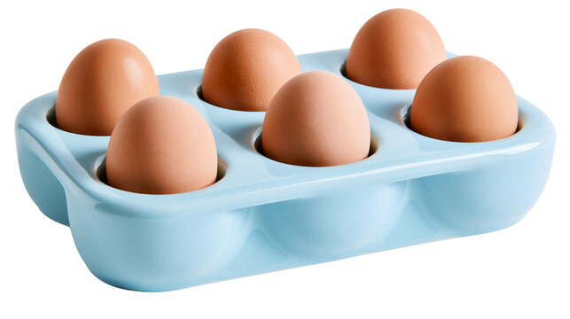 Six brown chicken eggs in a light blue ceramic holder, isolated on transparent background