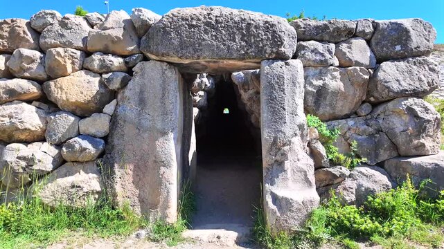 The entrance portal to the famous Yerkapı postern tunnel opens within cyclopean stone walls at ancient Hattusa, Turkey.