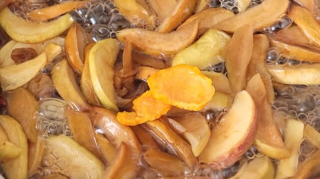 Boiling apple compote is a delicious drink.