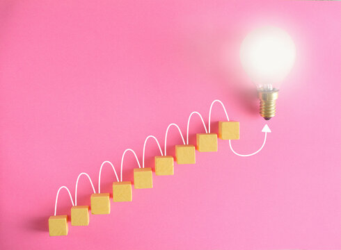 Business innovation concept,collaboration,cooperation,teamwork,idea,communication,human resources,recruitment,team building ladder of sucsess, light bulb with copy space.