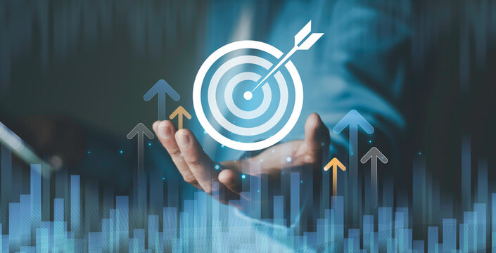 Growth strategy, financial investment success, business goals, performance, analytics and profitability. Target with bullseye icon above an open hand, rising financial chart and upward arrows.