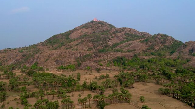 Aerial drone footage of Mandar Parvat in Banka, Bihar, showcasing the sacred hill, lush green landscape, surrounding countryside and historic pilgrimage site linked to Samudra Manthan.
