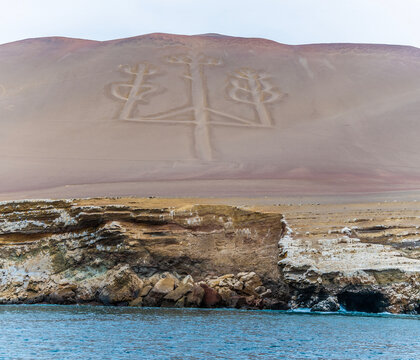 A view from a boat in Paracas Bay towards the Paracas Candelabro geoglyphs, Paracas, Peru in the dry season