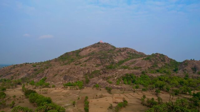 Aerial drone footage of Mandar Parvat in Banka, Bihar, showcasing the sacred hill, lush green landscape, surrounding countryside and historic pilgrimage site linked to Samudra Manthan.

