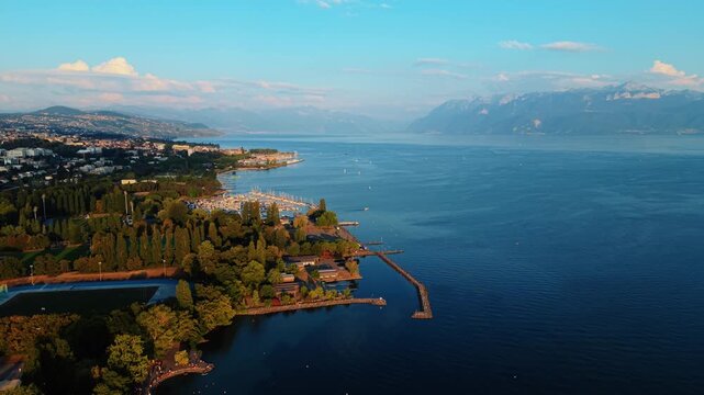 Aerial view of Pyramides de Vidy park and the marina on the shores of Lake Geneva in Lausanne, Vaud, Switzerland.