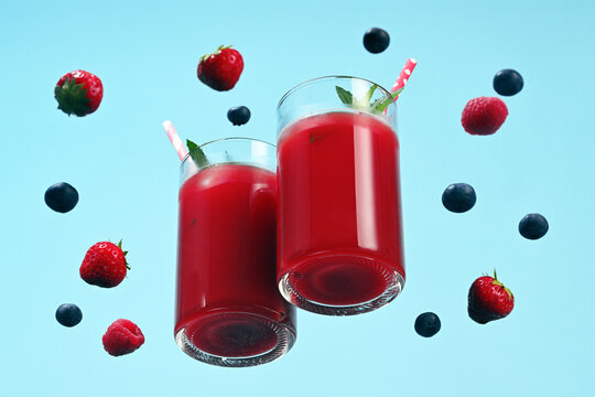 Two glasses with berry cocktail