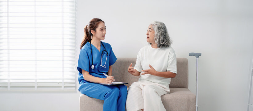 Healthcare professional advises senior woman about health concerns during comprehensive medical consultation providing wellness support in modern clinic setting