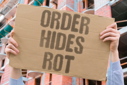 "Order Hides Rot" Apparent stability can mask deep structural decay. DECAY. STABILITY. MASKS. GOVERNANCE. FRAGILITY.