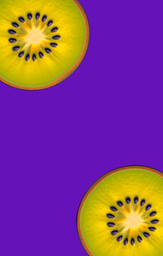 Two slice of green kiwi on a purple background. Fruit, symmetry, colors, book cover
