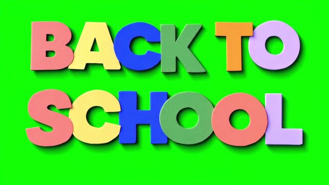 Animated "Back to School" text on green screen for chroma key compositing, education video editing and motion graphics