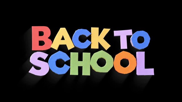 Animated "Back to School" text on black background for education, classroom presentations and motion graphics