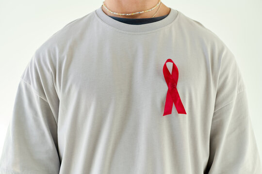 Movember symbol of hope and awareness displayed on a modern shirt in a bright setting