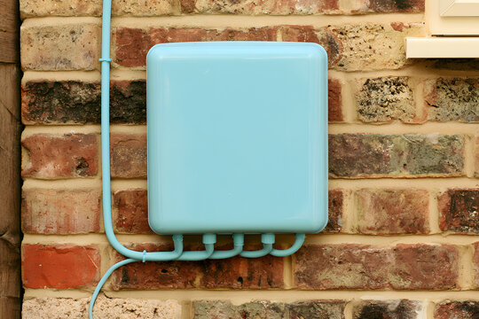 The entry point for the fibre broadband conduit and the termination box on the house wall
