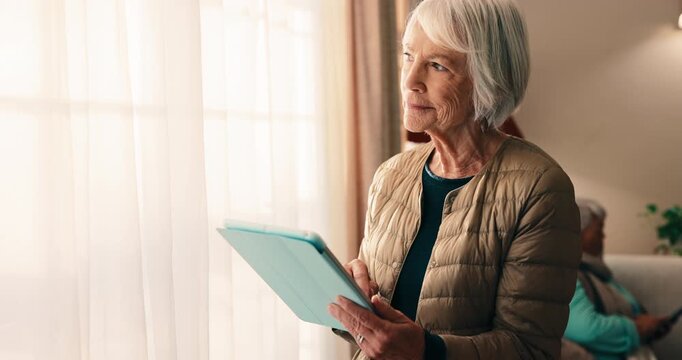 Thinking, tablet and senior woman by window in home with reading blog on app for pension planning. Happy, ideas and elderly person with technology for online article with newsletter subscription.